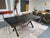 Live edge oak dining table with rustic ebonised dark black finish