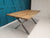 OAK DINING TABLE, 42MM THICK WITH VINTAGE FINISH AND STEEL X STYLE LEG