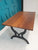 Outdoor / conservatory  dining table, solid teak hardwood top, cast iron legs