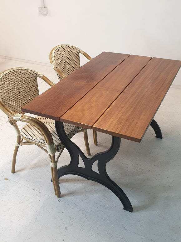 Outdoor / conservatory  dining table, solid Iroko hardwood top, cast iron legs