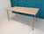 Ash dining table with hairpin legs in gold finish, €300 off original price