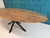 Handcrafted solid oak oval dining table with star/spider base in choice of 4 finishes