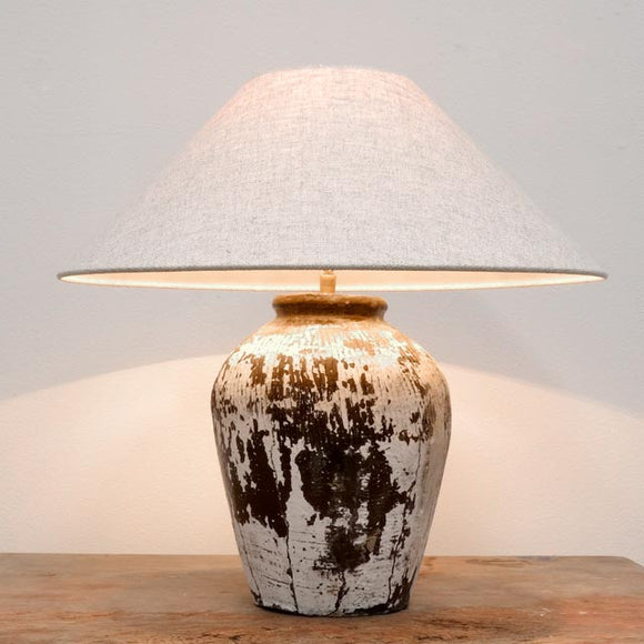Small white washed pottery table lamp including shade